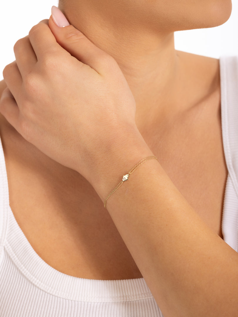 14k gold Mystic Gold & Single Diamond Hamsa Bracelet